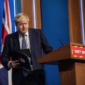 Boris Johnson to stick with ‘Plan B’ Covid measures despite mounting pressures (Photo by JACK HILL/POOL/AFP via Getty Images)

