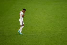 Marcus Rashford reacts after missing England's third penalty in the penalty shoot out during the UEFA Euro 2020 Championship Final against Italy (Photo by John Sibley - Pool/Getty Images)
