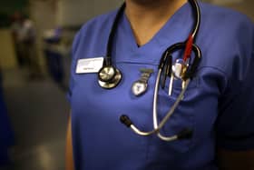 A report by the Health and Social Care Committee called for immediate action to support exhausted staff who have worked throughout the Covid-19 pandemic (Getty Images)