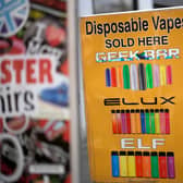 Advertising boards promote vaping devices outside a shop in Manchester (Photo: Christopher Furlong/Getty Images)