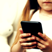 As more children get smartphones at a younger age, parents face growing pressure to strike a balance between independence and online safety