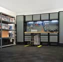 A complete BiGDUG garage setup showing how shelving, cabinets and a workbench can transform a cluttered space into a practical workshop