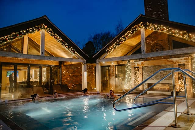 The heated outdoor vitality pool is at the heart of the Moddershall Oaks spa experience, with countryside views and cocktails delivered straight to the water.