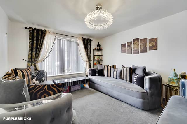 The living room is one of several ground-floor spaces