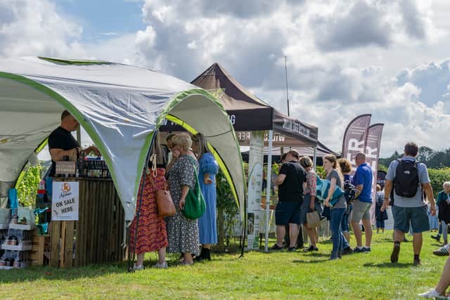 Visitors exploring the stalls on Open Day at Warden Abbey Vineyard