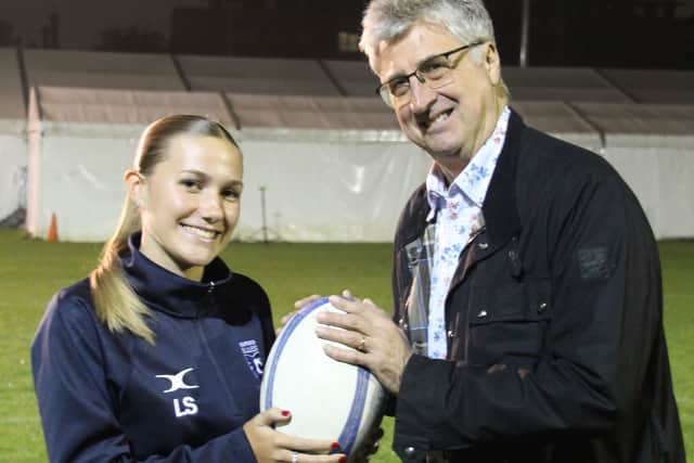 Food etc volunteer Colin Haine with Bedford Blues player Laura Stephens