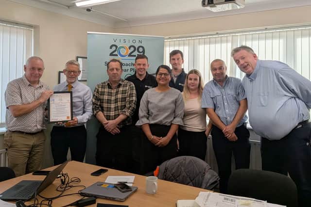 Ian (far left) received his award certificate