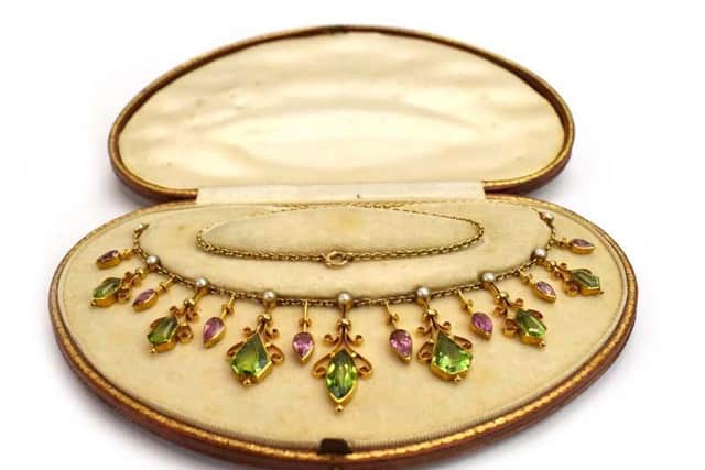 An early 20th century 15ct gold fringe necklace in a fitted case  Estimate 800 - 1,000