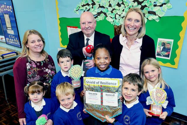 L to R: Jo Dormer (Deputy Headteacher), CALA Homes' Patrick Danagher and Elizabeth Fordham (Mind Map Charity) with Daisy (5), Euan (8), James (4), Maya (9), Niko (7) and Imogen (8). Photo by Tim George