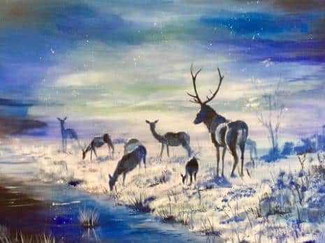Gathering of deer on a frosty winter morning by Marie King