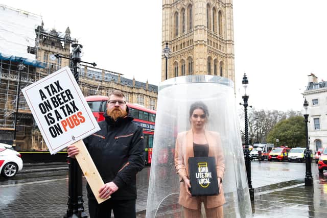 Candice Brown protested outside Parliament
