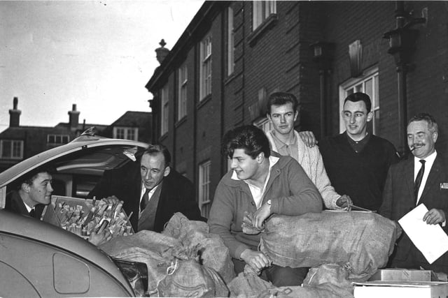 King Edward VII School pupils distribute logs for senior citizens in Lytham and St Annes in 1962