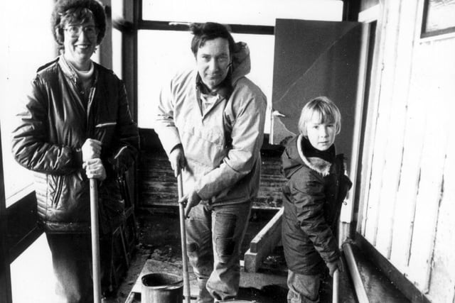 Mopping up in Lytham at the Ribble Cruising Club building on the river bank following a flood in 1977