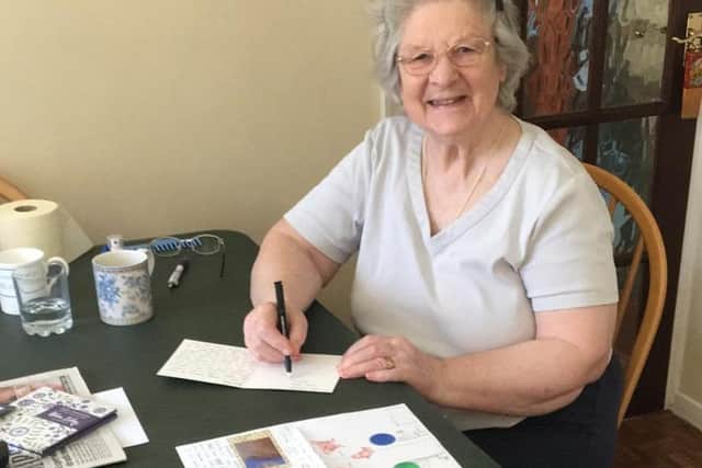 Home Instead Senior Care client, Diane with her Sunshine letter