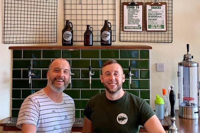 Tim Edwards, owner of Beerfly and Wesley Neville, assistant manager