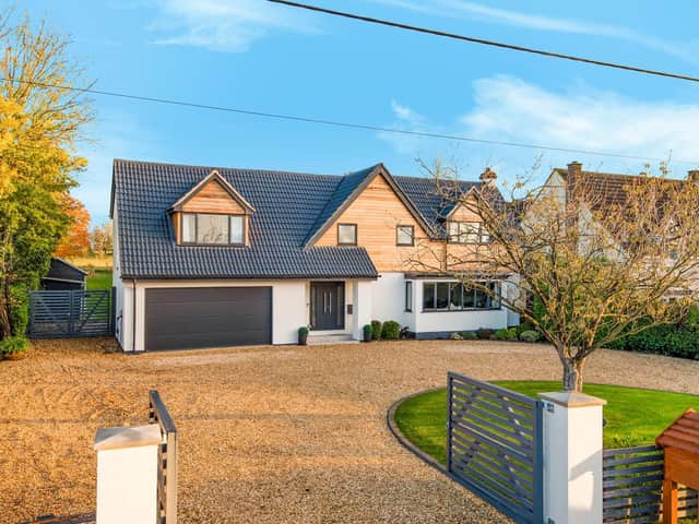 This is a much improved, five bedroom detached family home.