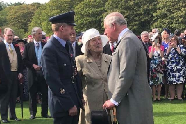 Iva Barr, with her friend and RAF veteran David Green, when she was greeted by the Prince of Wales last year