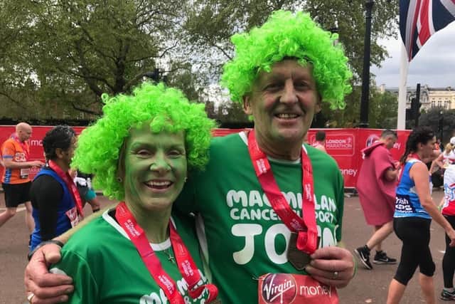 John Pearson has retired as Macmillan’s executive director for Cancer Support Operations, but will continue to support the charity by fundraising with his wife Sue, pictured with him above at the London Marathon