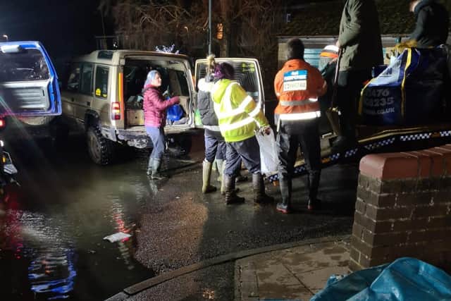 Shane Pearson and his mates helping out those who had been hit by the Christmas floods