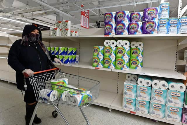 Shoppers faced with a shortage of loo roll on the shelves are now buying kitchen roll  (Photo by JUSTIN TALLIS/AFP via Getty Images)