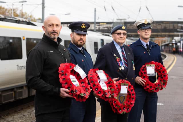 Railway colleagues were joined at Bedford station today by officers from nearby RAF Henlow to help transport a poppy wreath into London.