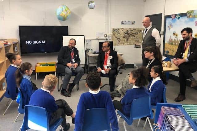 Andy George, headteacher of Shackleton Primary, Russell Hobby, CEO of Teach First and MP Mohammad Yasin with pupils