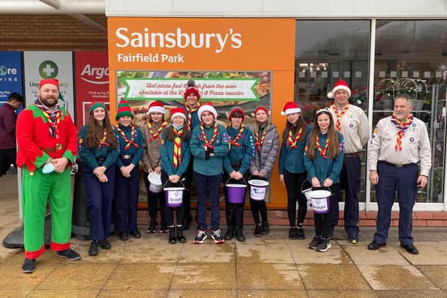Fundraising for the Jamboree with Nick (left) dressed as an elf.