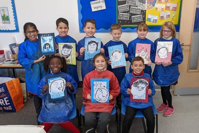 Pupils from the Oak 3 class at Marston Moreteyne VC School with their artwork