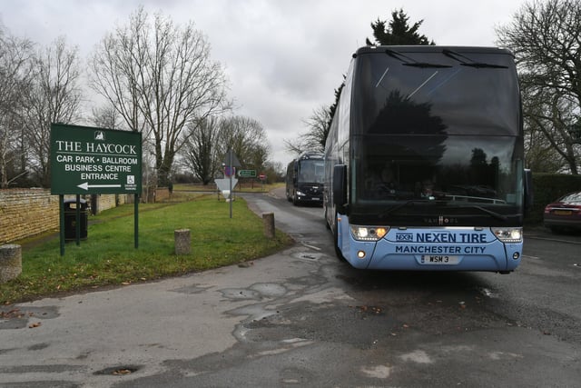 Manchester City's team bus arrives at the Haycock Hotel, Wansford.