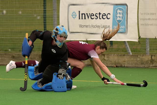 Ellie Scott showing total commitment for the Ladies 1s