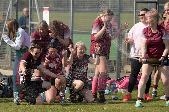 The Ladies 5s celebrate their promotion