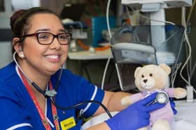Sister Nicola Lane at Bedford Hospital has a listen to teddy's heart