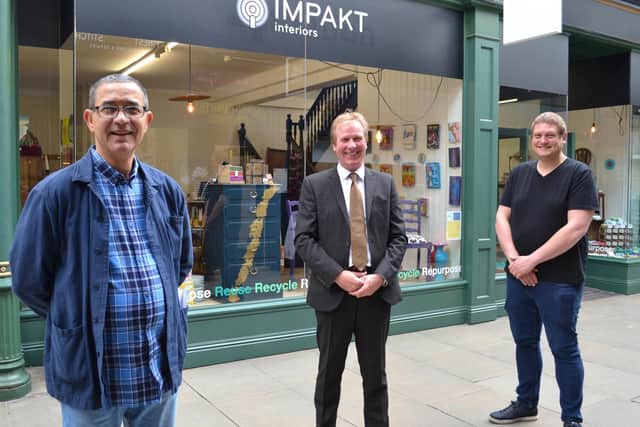 Paul Hunt, centre, with the team at IMPAKT Interiors - the upcycling shop in The Arcade