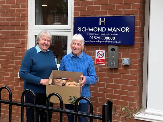 The food packages, including the delicious Richmond homemade bread, were picked up by Adela Walster, left and Stella Brooks