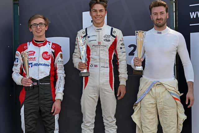 Bedford's Alex Walker (centre) on top of the podium after his victory in Scotland (Picture by Jim Moir)
