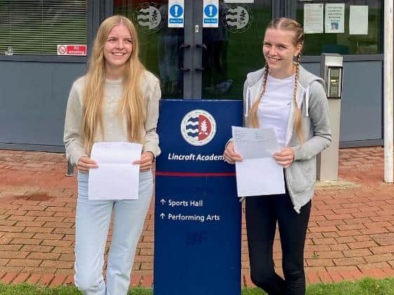 The Webb sisters, Ashley (left) and Mia (right), collecting their A Level Russian grades