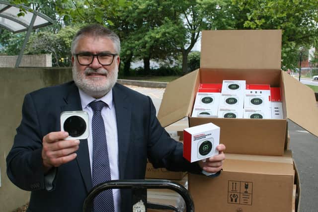 Mayor Dave Hodgson with the CO2 monitors