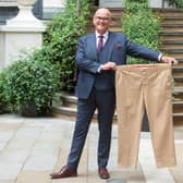 Ken McLeod with a pair of his old trousers