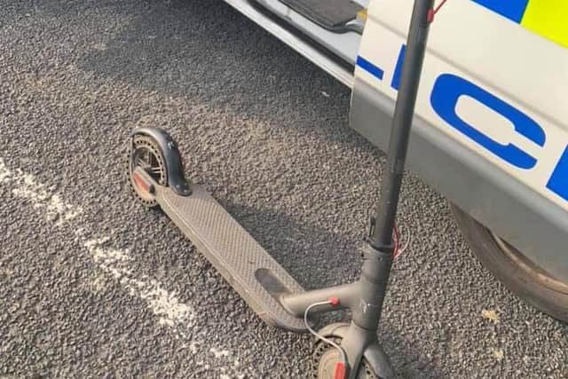 Police seize an e-scooter