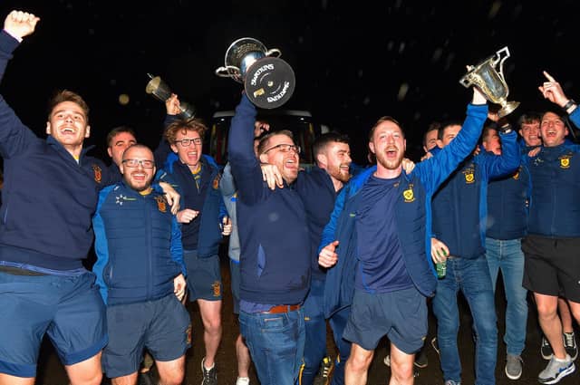 Brian Og’s team manager Hugh McGrath and captain Neil Forester lead the Derry, Ulster and All Ireland Intermediate Football champions' homecoming at Steelstown on Monday evening. Photo: George Sweeney. DER2206GS – 067