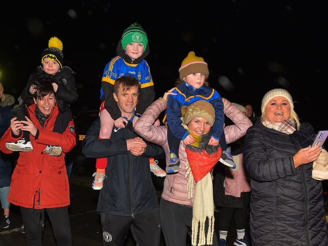 Fans gather at Steelstown GAC for the homecoming of Derry, Ulster and All Ireland Intermediate Football Champions Brian Og’s on Monday evening. Photo: George Sweeney. DER2206GS – 079