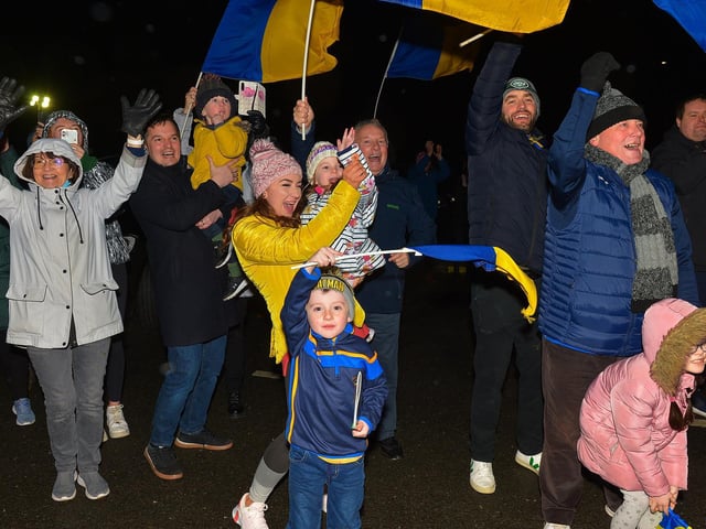 Fans gather at Steelstown GAC for the homecoming of Derry, Ulster and All Ireland Intermediate Football Champions Brian Og’s on Monday evening. Photo: George Sweeney. DER2206GS – 081