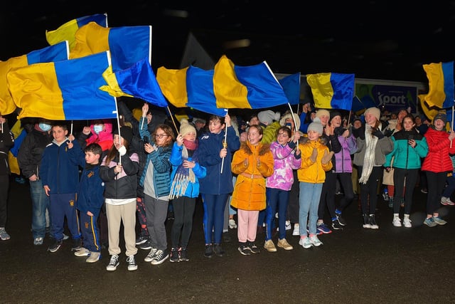 Supporters gather at Steelstown GAC for the homecoming of Derry, Ulster and All Ireland Intermediate Football Champions Brian Og’s on Monday evening.  Photo: George Sweeney.  DER2206GS – 078