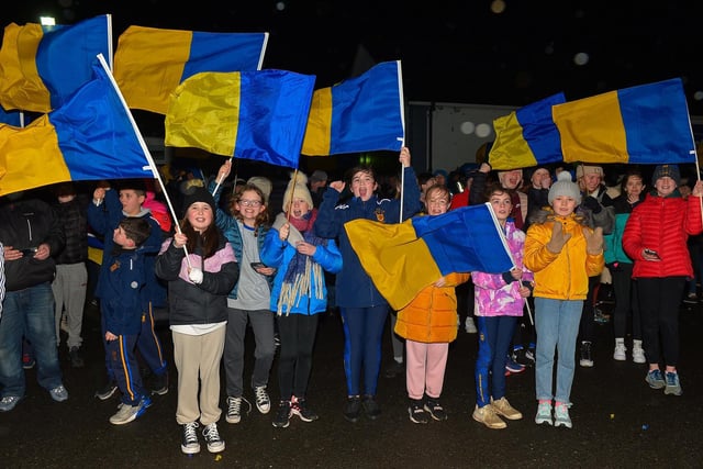Supporters gather at Steelstown GAC for the homecoming of Derry, Ulster and All Ireland Intermediate Football Champions Brian Og’s on Monday evening.  Photo: George Sweeney.  DER2206GS – 078