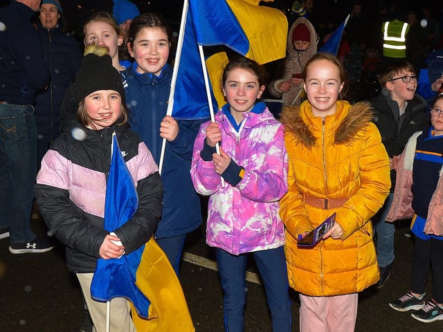 Young fans at Steelstown GAC for the homecoming of Derry, Ulster and All Ireland Intermediate Football Champions Brian Og’s on Monday evening.  Photo: George Sweeney.  DER2206GS – 082