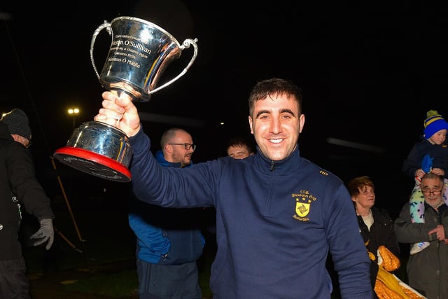 Ryan Devine pictured with the All Ireland Intermediate Football Championship trophy at Brian Og’s homecoming to Steelstown on Monday evening.  Photo: George Sweeney.  DER2206GS – 069