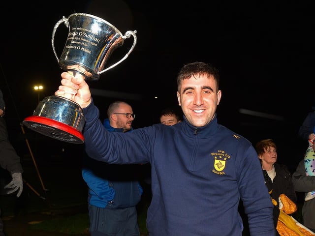 Ryan Devine pictured with the All Ireland Intermediate Football Championship trophy at Brian Og’s homecoming to Steelstown on Monday evening. Photo: George Sweeney. DER2206GS – 069