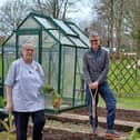 Hospice Chef Sandra Galton and gardening volunteer Debbie Brown in the kitchen garden