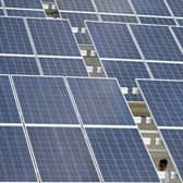 Close up of solar panels.   (Photo credit should read NOEL CELIS/AFP via Getty Images)