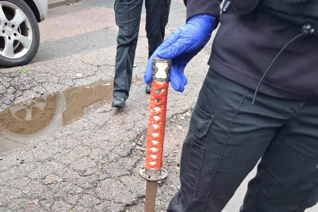 Police seized a sword during the raid in Brickhill